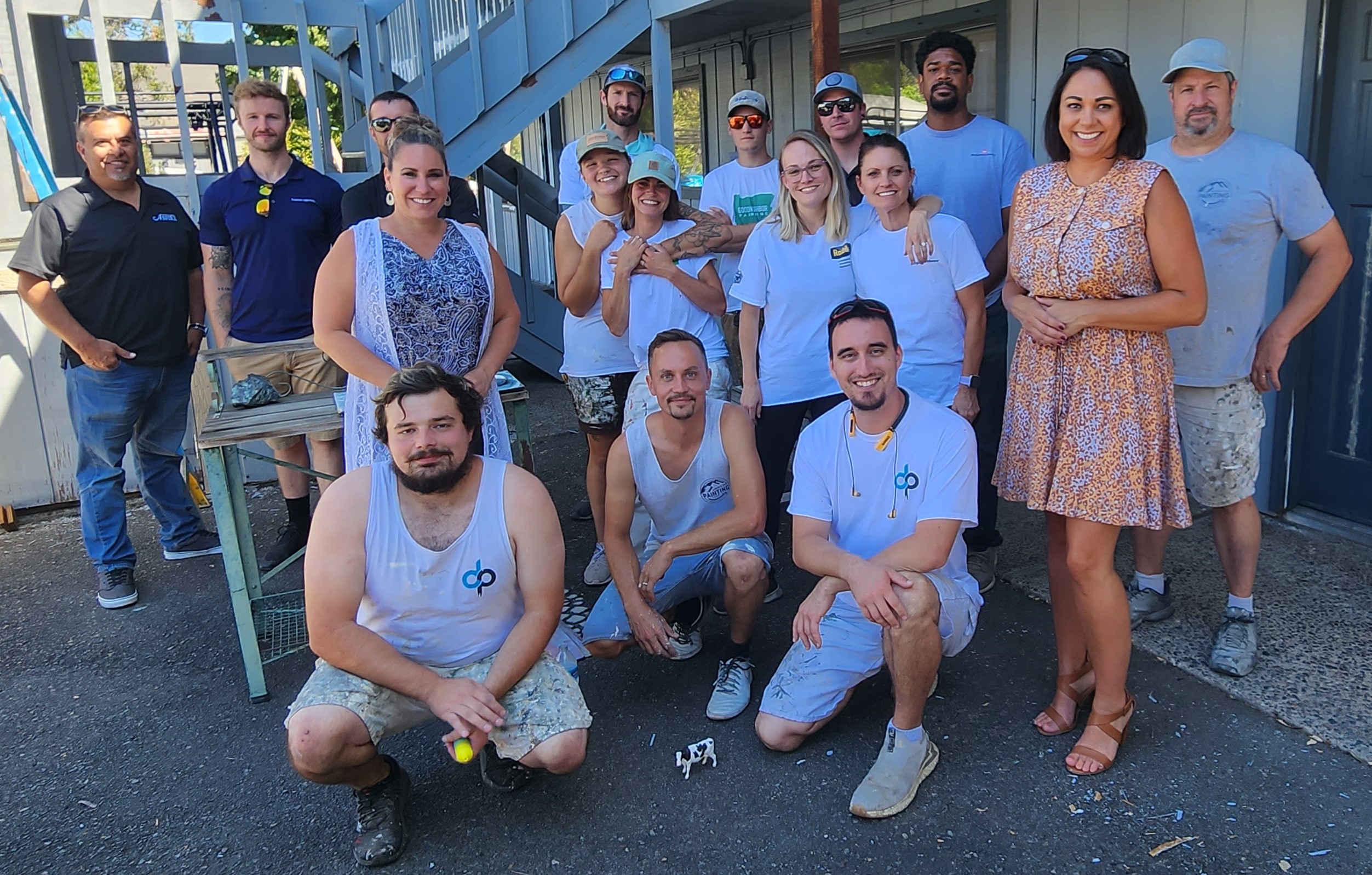 A group of people standing next to each other.
