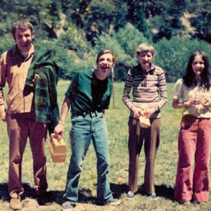 Four Young Adults standing in the forest
