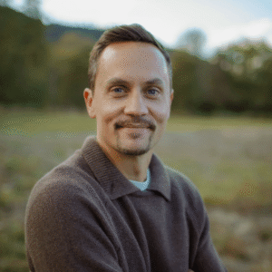Stephen Edwards, Board Member, Smiling in Field