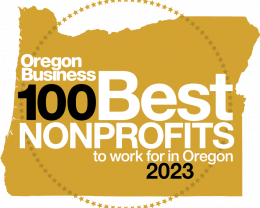 A gold circle with the words " oregon business 1 0 0 best nonprofits to work for in oregon 2023 ".